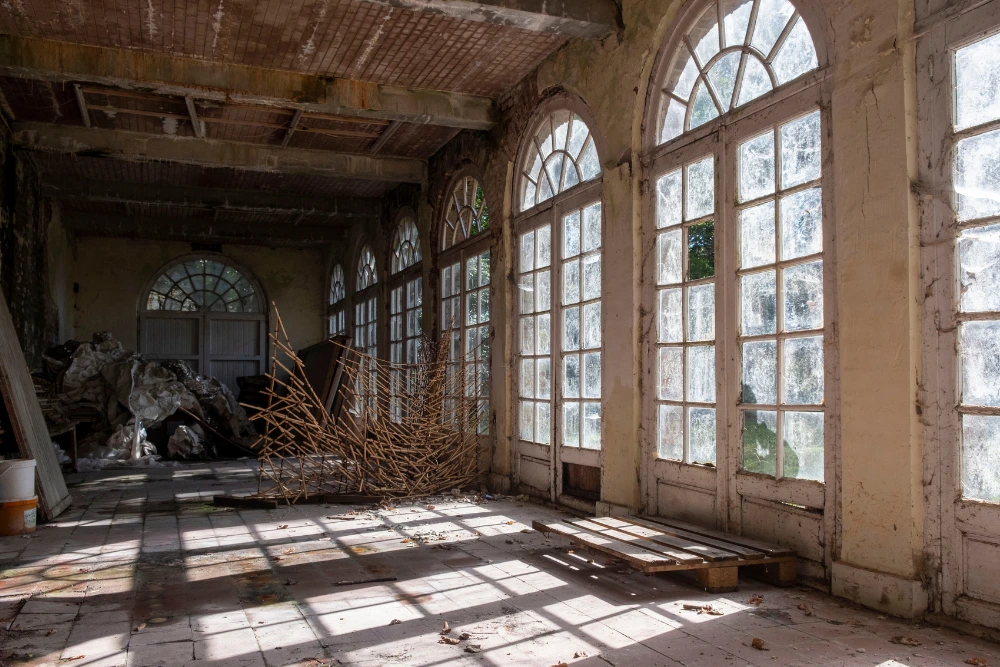Sunlight falling into an abandoned glass hall